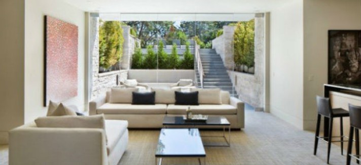 -and-rooms-with-floor-to-ceiling-glass-that-flow-outside-to-the-grounds