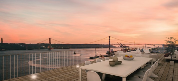 Desfrutar do pôr do sol com vista para o rio Tejo 