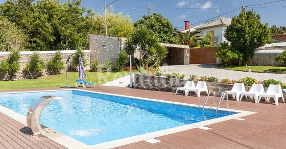 Casas de fim de semana: A beleza de uma casa de pedra com piscina em Esposende (fotos) 