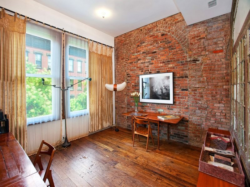 wood-and-brick-are-prominent-materials-in-almost-every-room