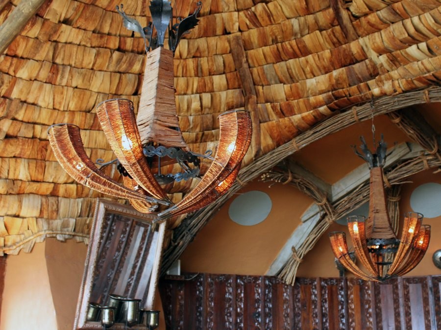 the-beaded-chandeliers-hanging-from-woven-banana-bark-ceilings-were-particularly-cool