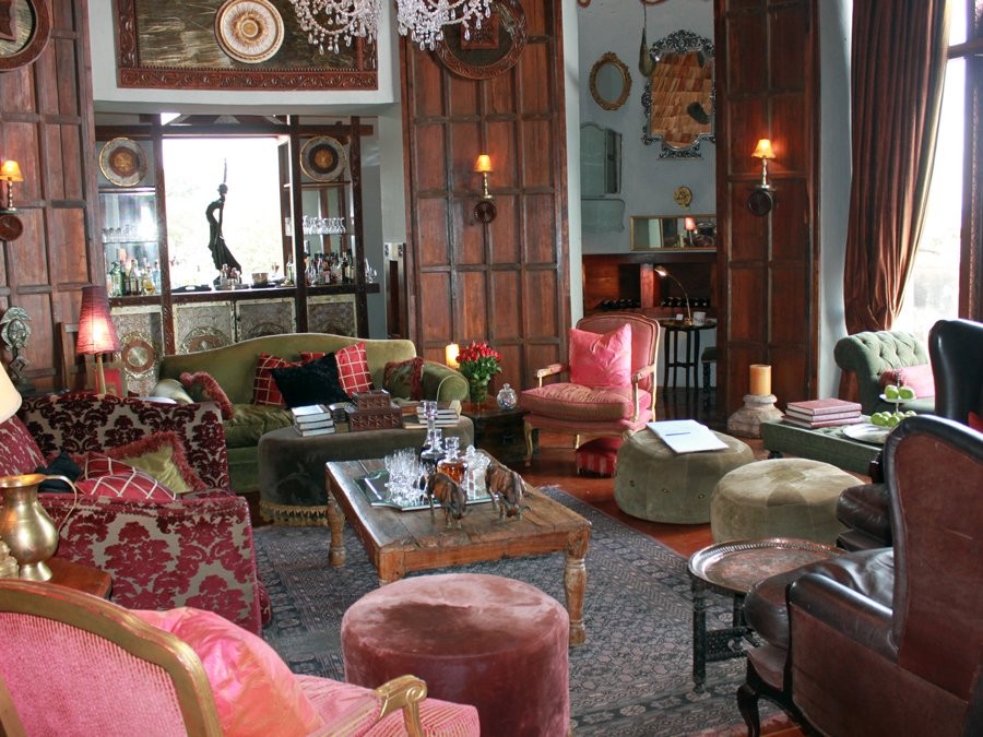 the-sitting-room-in-the-south-camp-lodge-was-opulent-there-were-carved-wooden-panels-brocade-sof