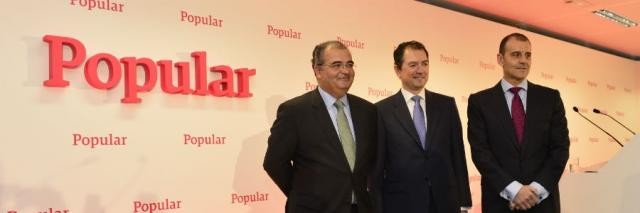 À esquerda, Ángel, Ron, presidente do Banco Popular