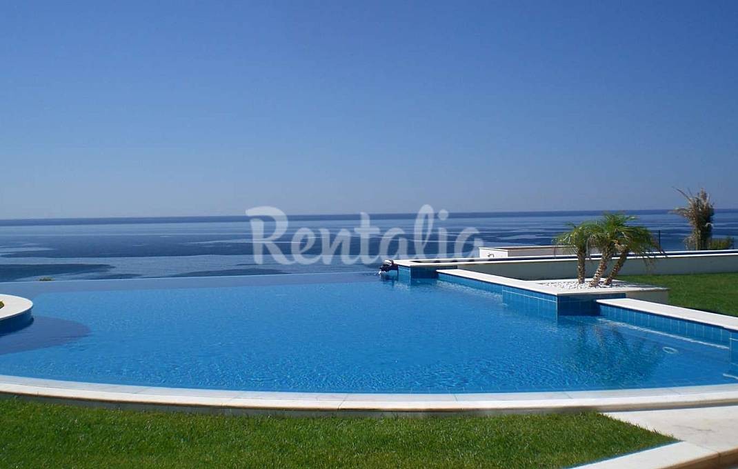 Casas de fim de semana: mergulhar numa piscina com vista para o mar em Lagos (fotos) 