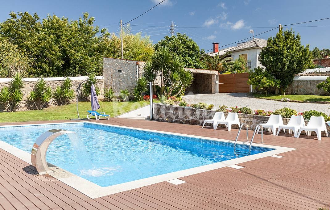 Casas de fim de semana: A beleza de uma casa de pedra com piscina em Esposende (fotos) 