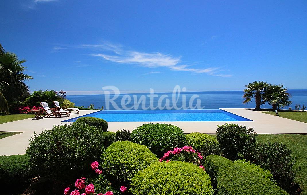 Casas de fim de semana: Um paraíso de janelas abertas para o mar na Madeira