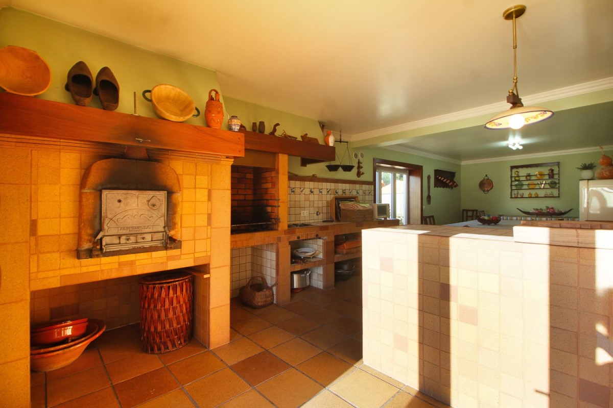 The kitchen has a traditional oven