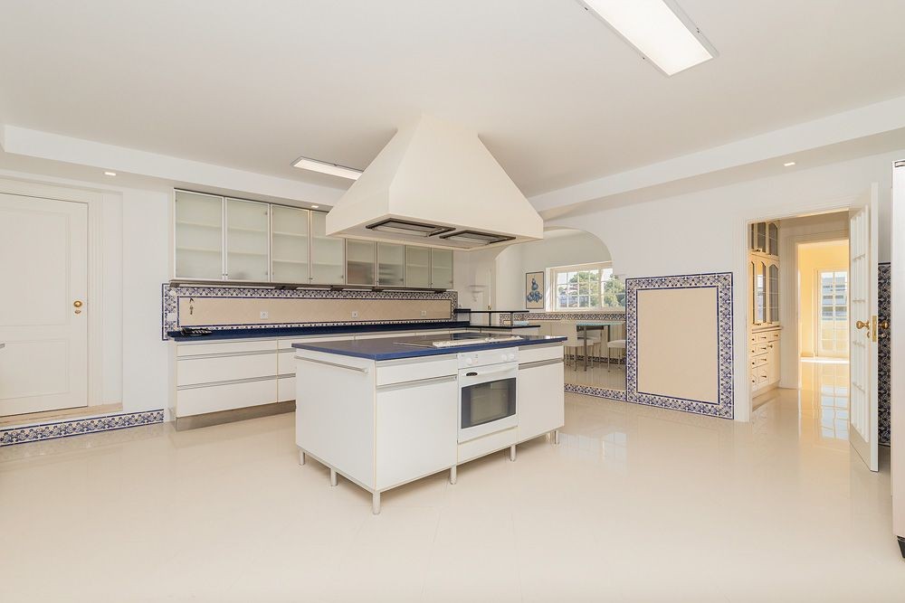 There is azulejo tiling in the kitchen and bathrooms