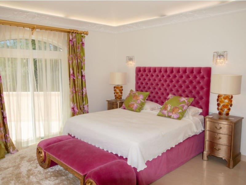 This double bedroom leads straight onto the terrace balcony through French doors
