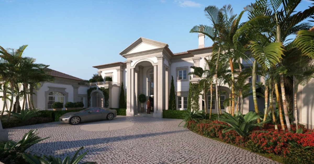 Grand archways and green spaces characterise the property