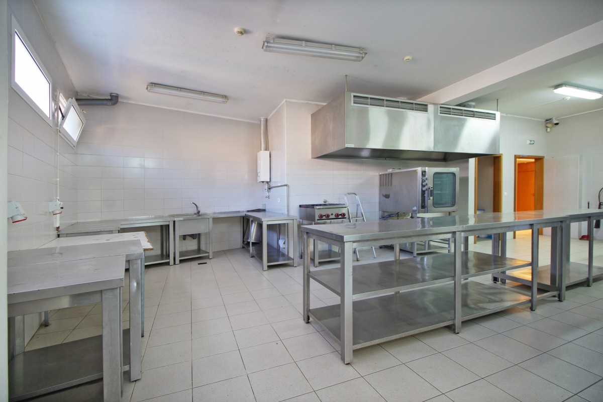 Aside from the professional chef's kitchen, there are private living quarters for the owners