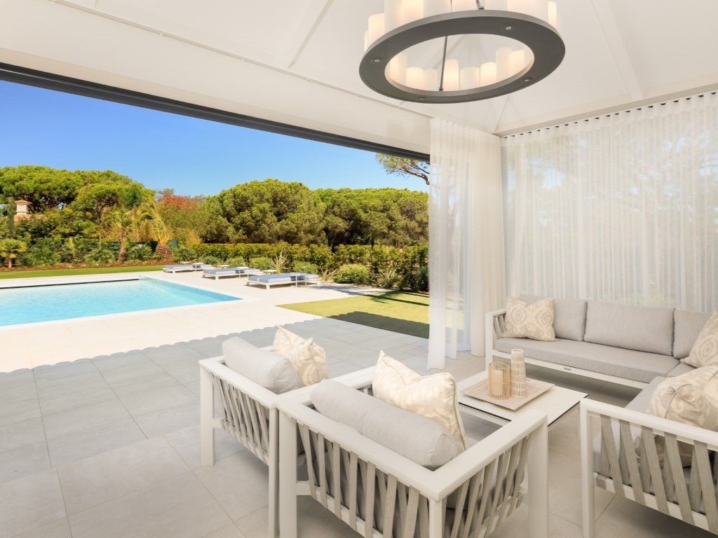 Outside sitting area with view of the pool