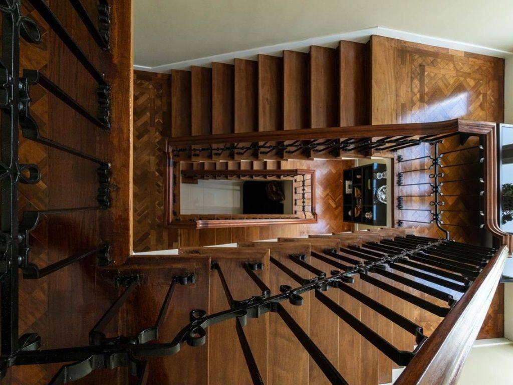 The property has an impressive wooden staircase