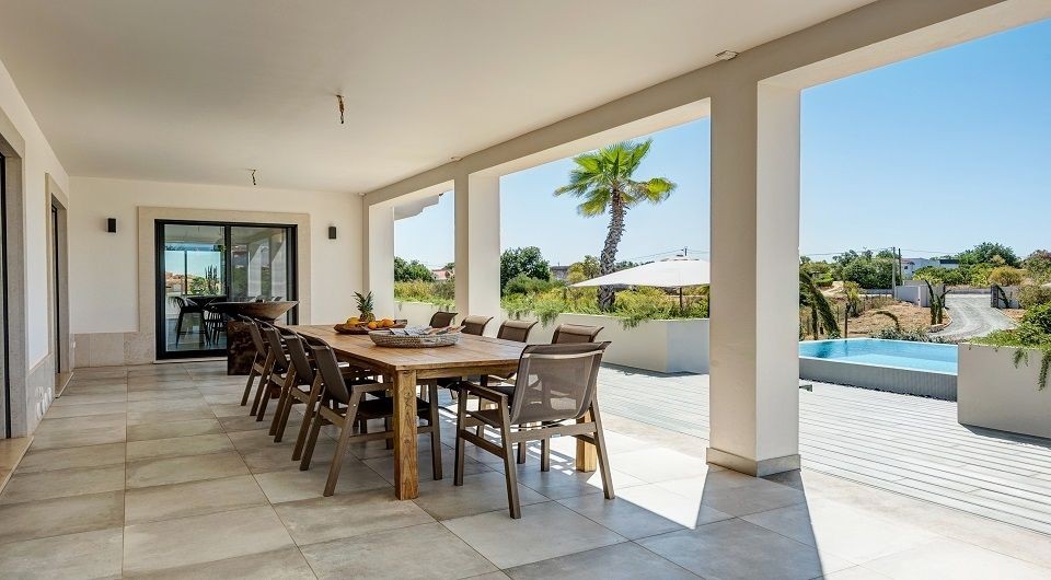 The property has outdoor terraces perfect for dining