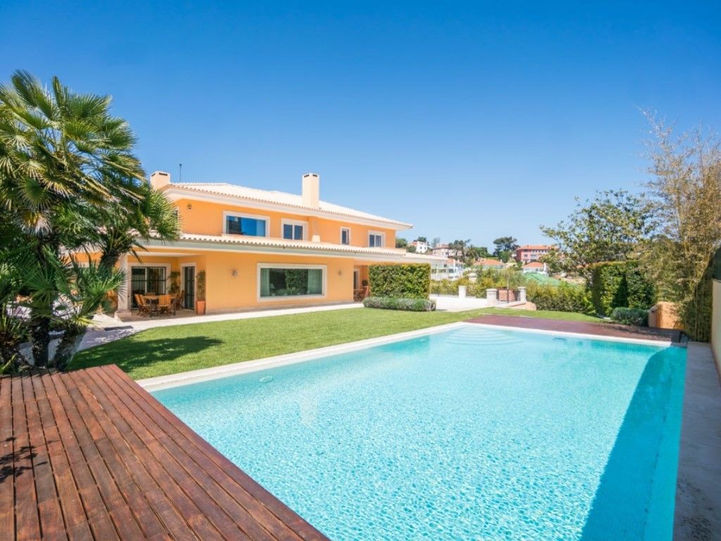 The villa has a large swimming pool and decked area