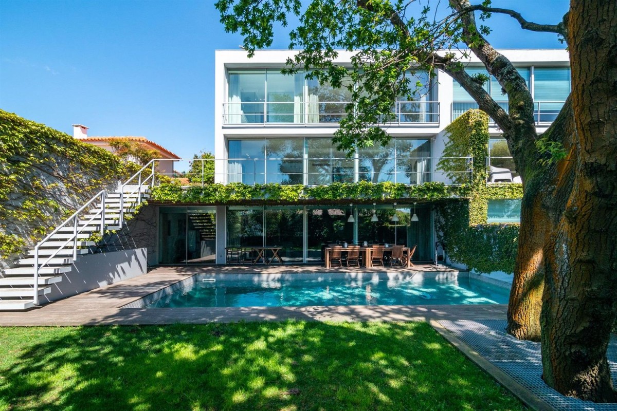 This bright, modern villa is for sale in Porto