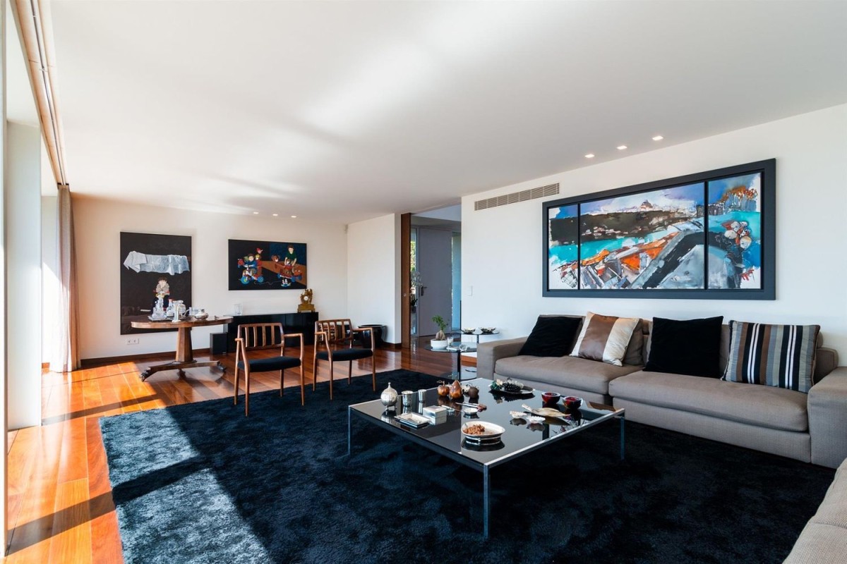 The living area is bright and takes advantage of large windows The living area is bright and takes advantage of large windows