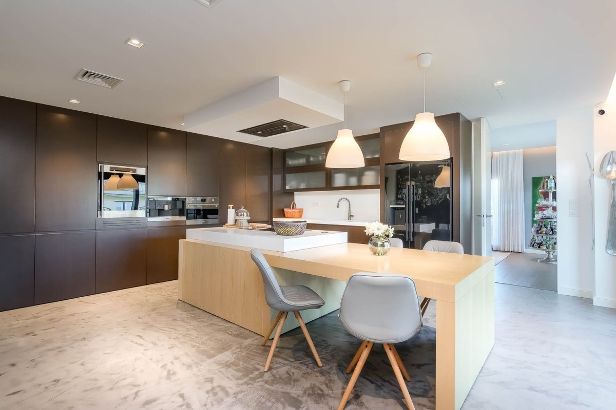 The kitchen is modern and finished to the highest quality