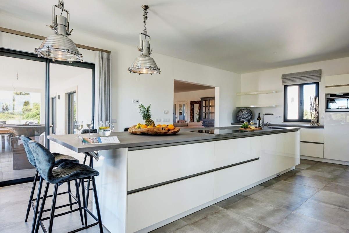 The kitchen is modern with top of the range appliances The kitchen is modern with top of the range appliances