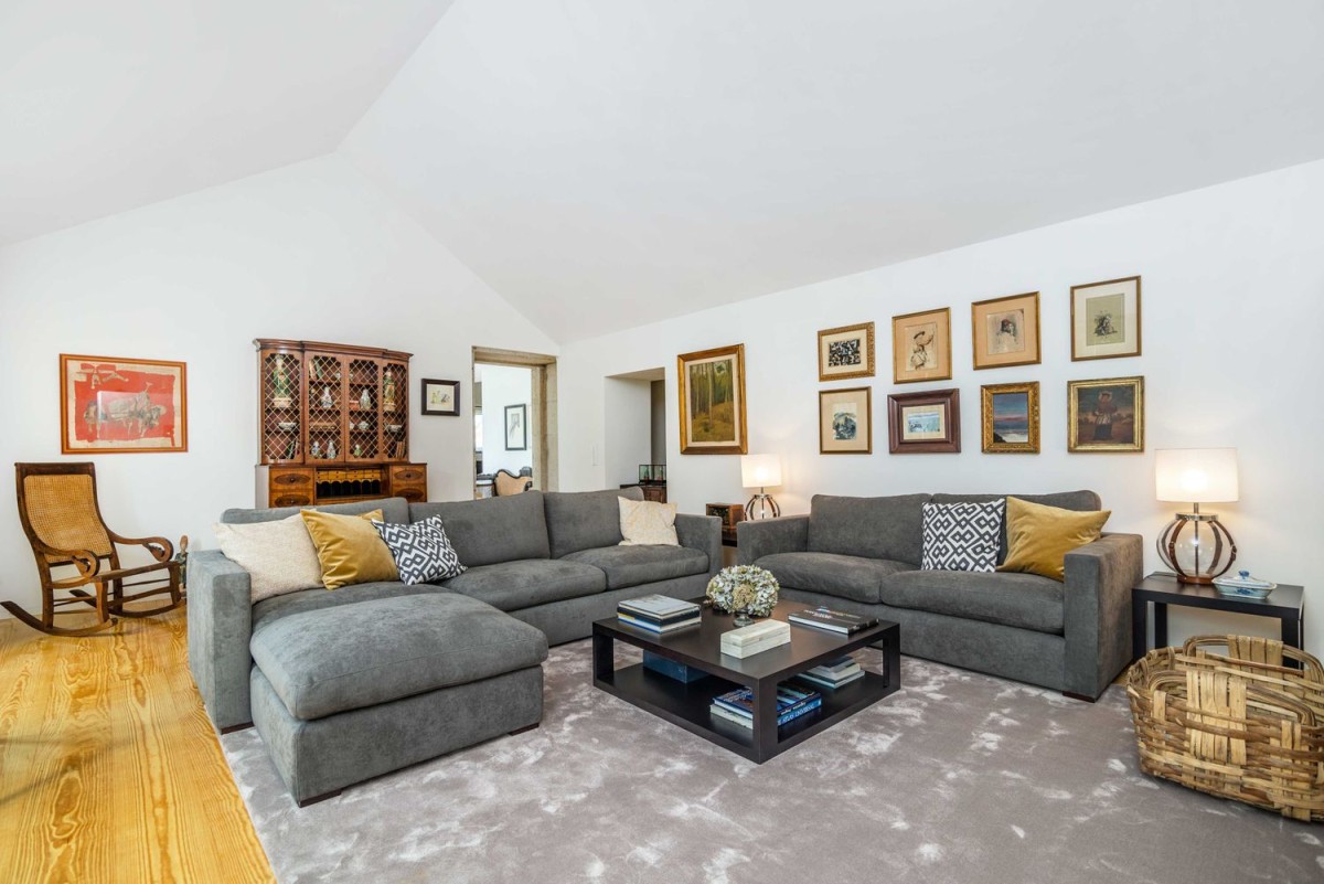 The main living area is open and spacious with high ceilings