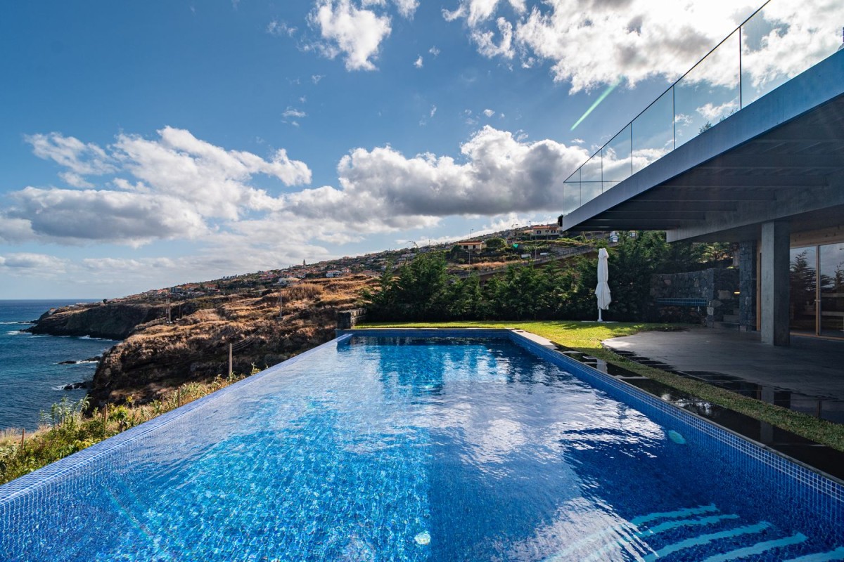 The property has a large infinity pool with spectacular sea views