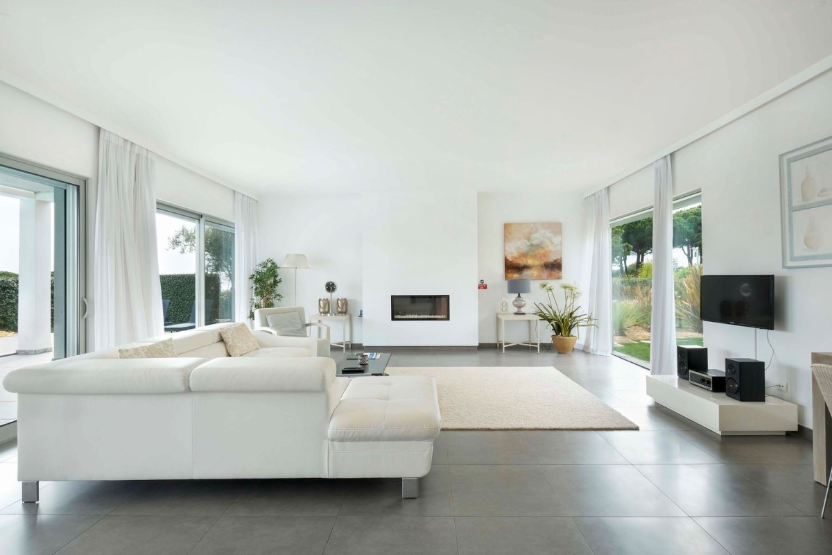 The living room sets the theme for the natural colour scheme found throughout the villa