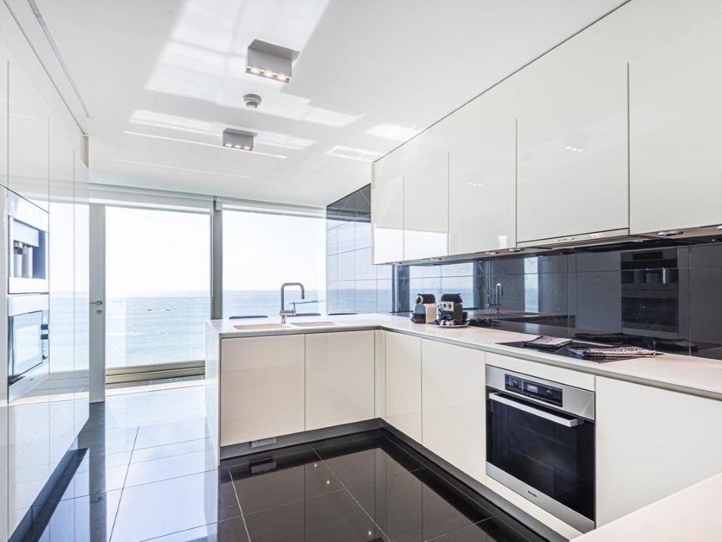 The kitchen is modern and spacious