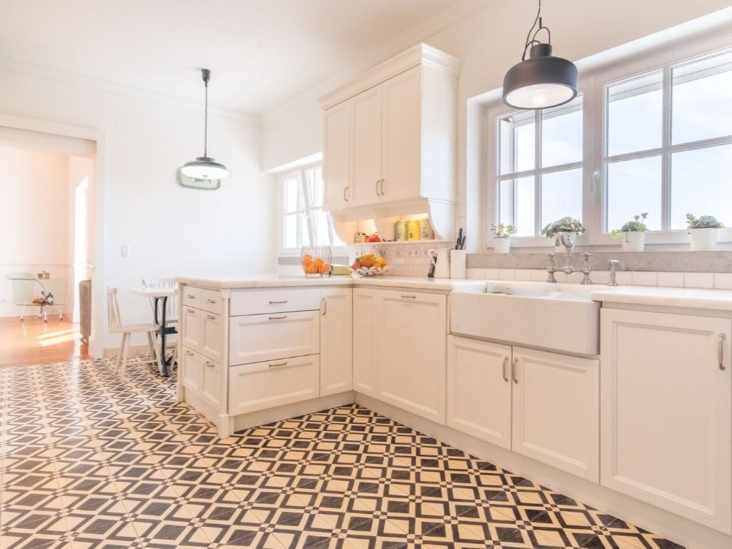 The kitchen is modern and spacious