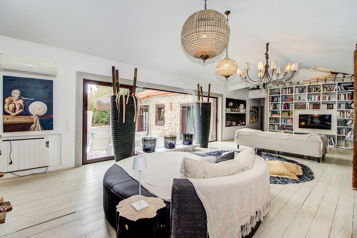 The main living area is spacious and modern with eclectic design