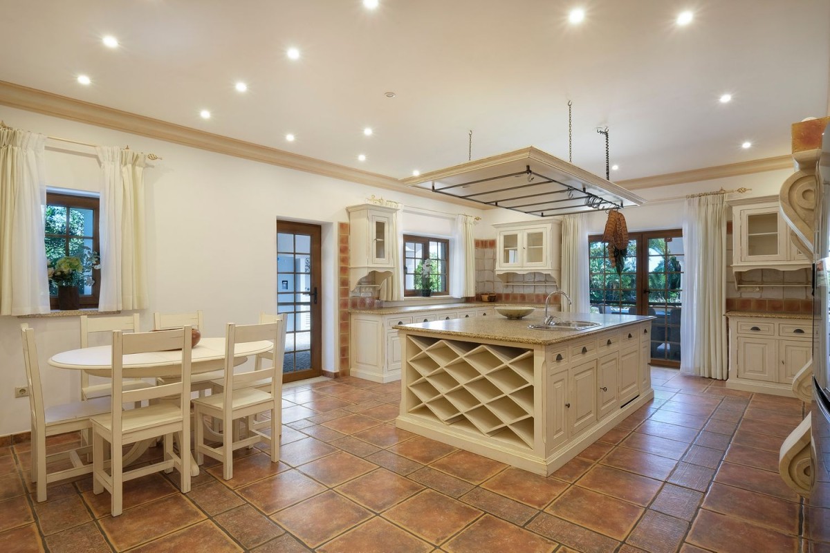 The kitchen is traditional and spacious