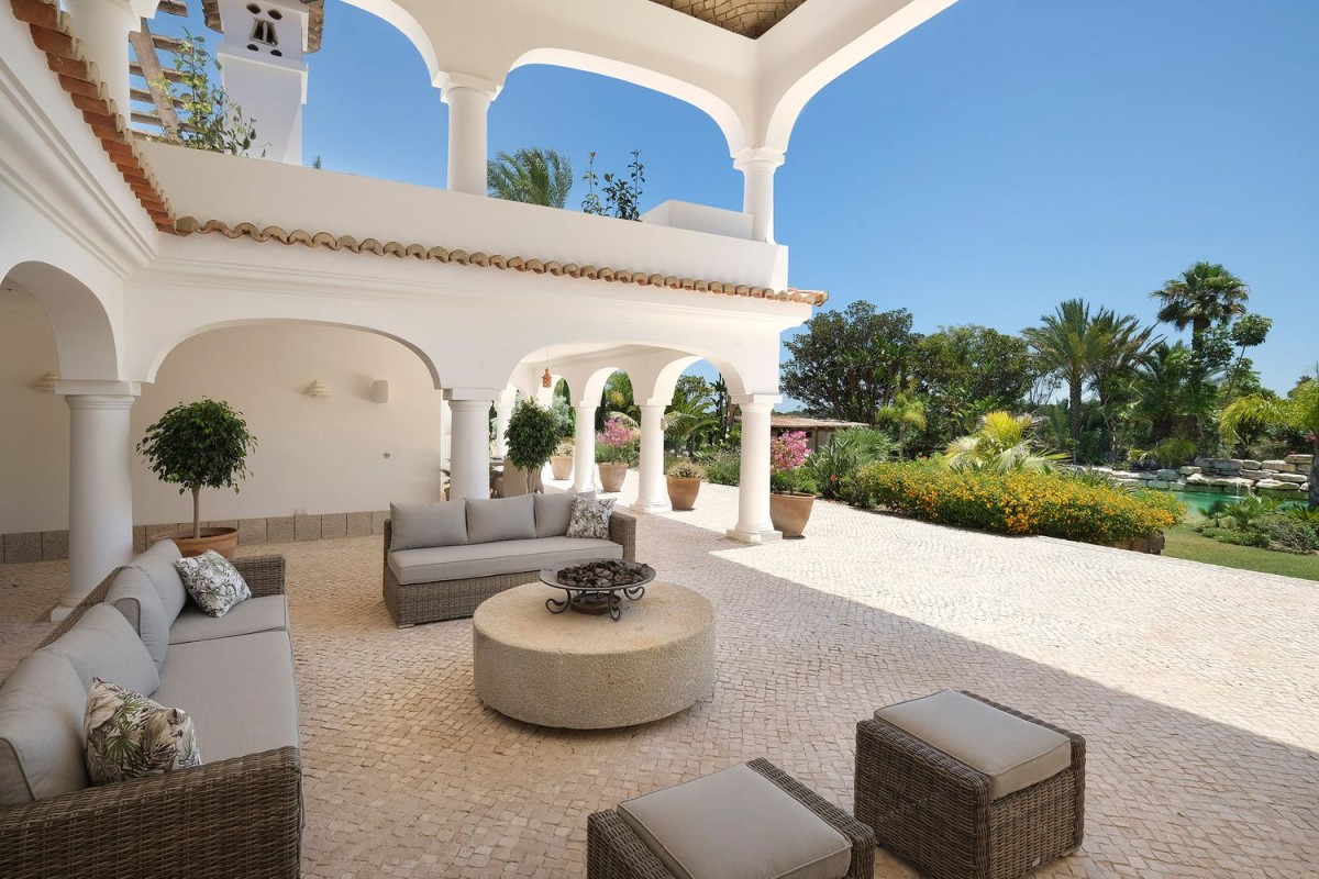 The villa has a number of large outdoor areas for relaxing