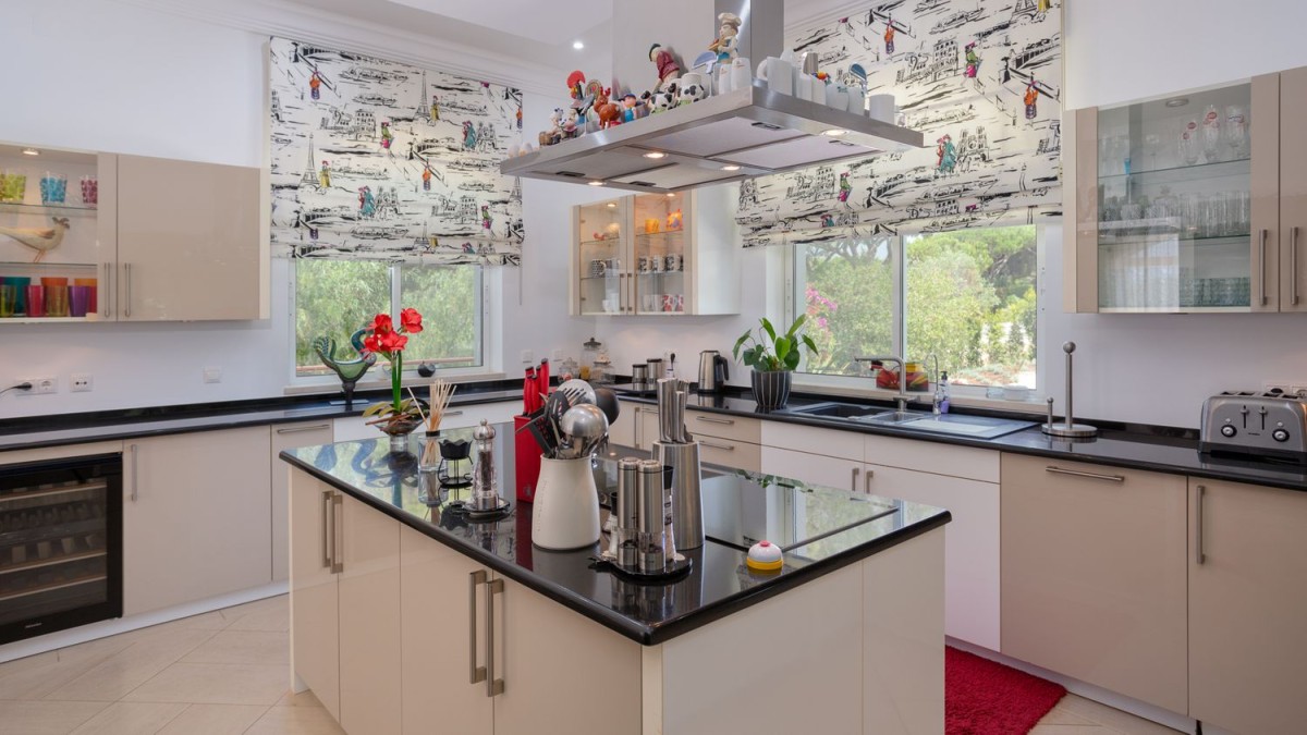 The kitchen is modern and with top of the range appliances