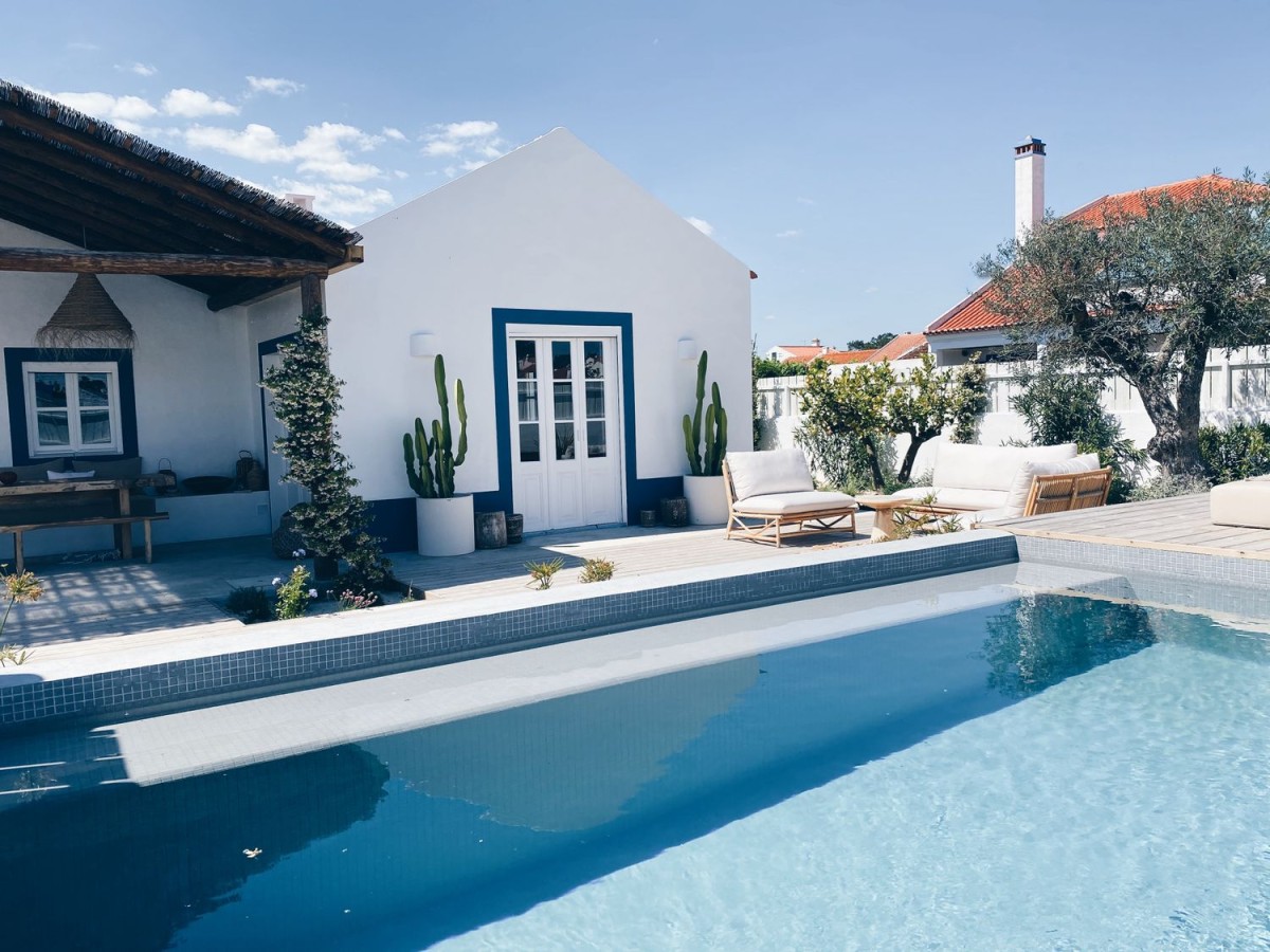 The pool is spacious and is surrounded by terraced areas