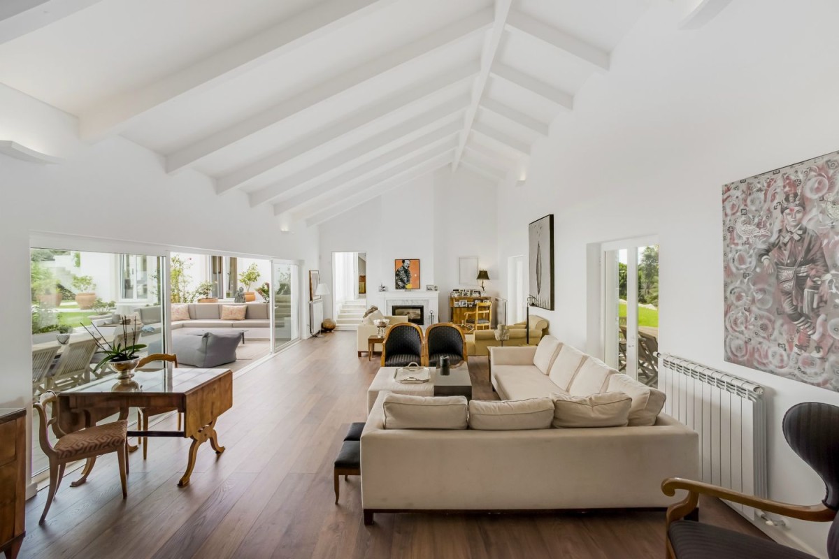 The living room has beautiful wooden ceiling features The living room has beautiful wooden ceiling features