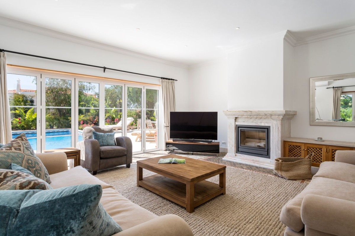 The living room opens directly onto the garden