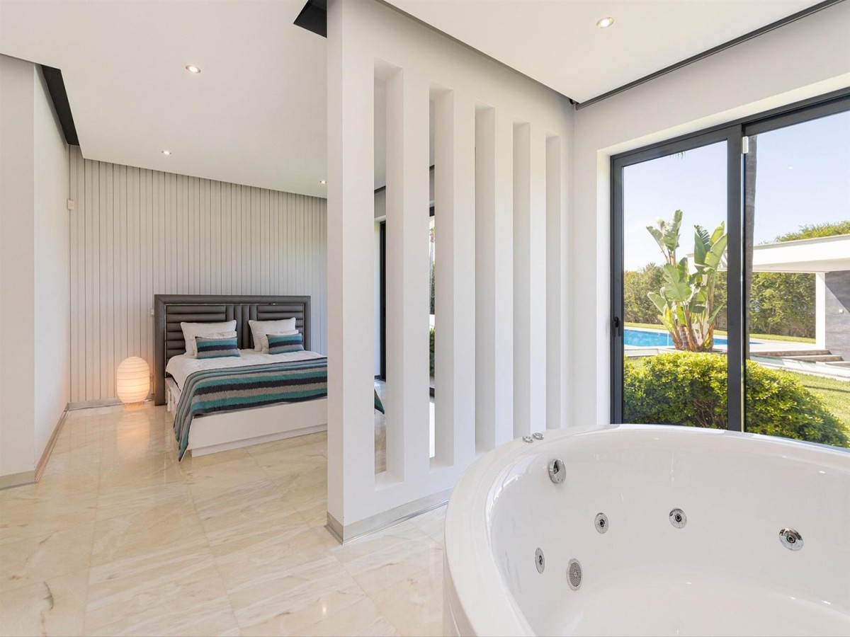 Many of the bedrooms have bathtubs and garden views