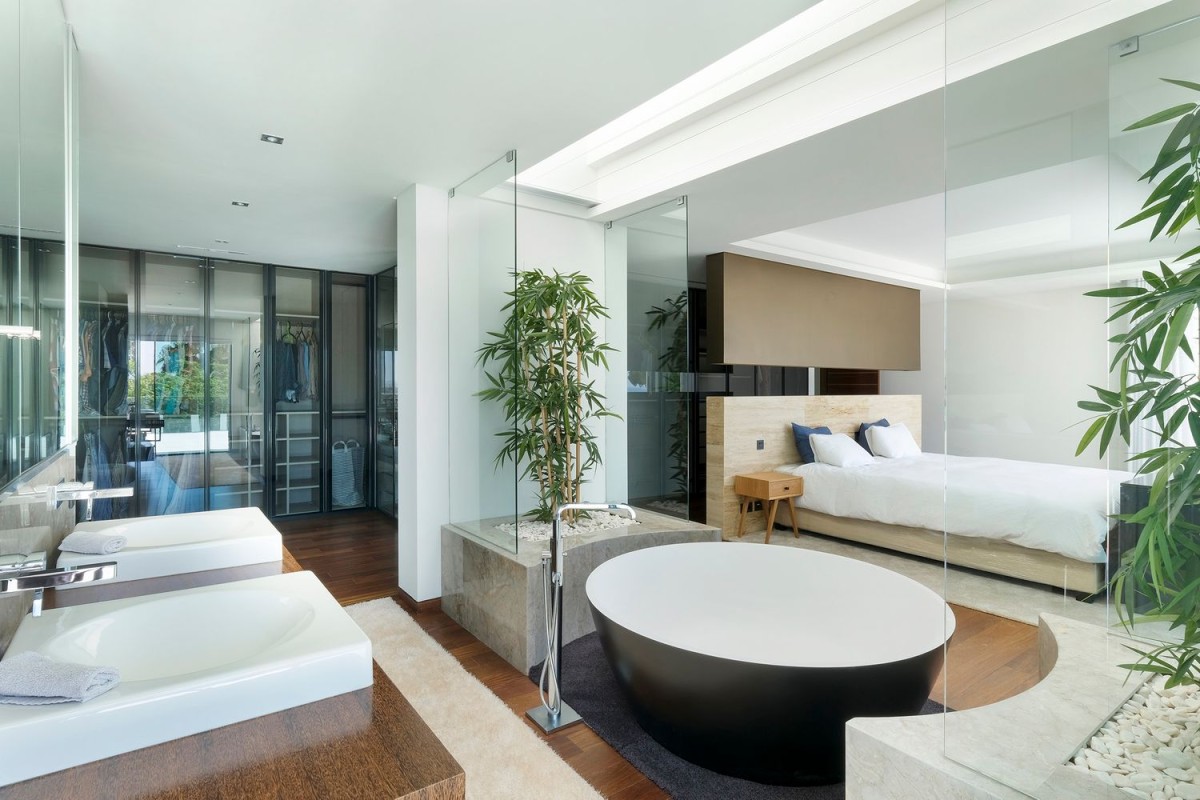 The spectacular master bedroom has a unique bathtub