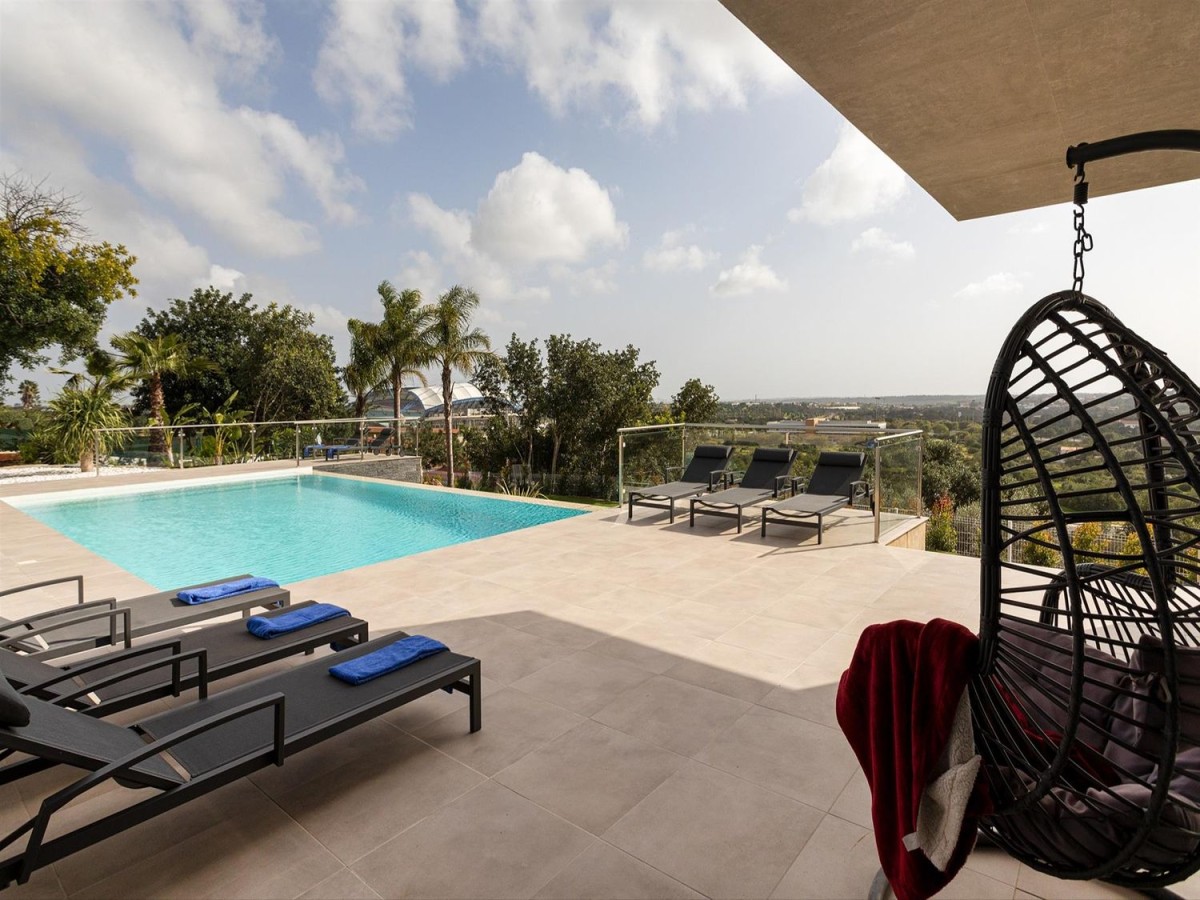 Countryside views can be enjoyed from the terrace and pool area