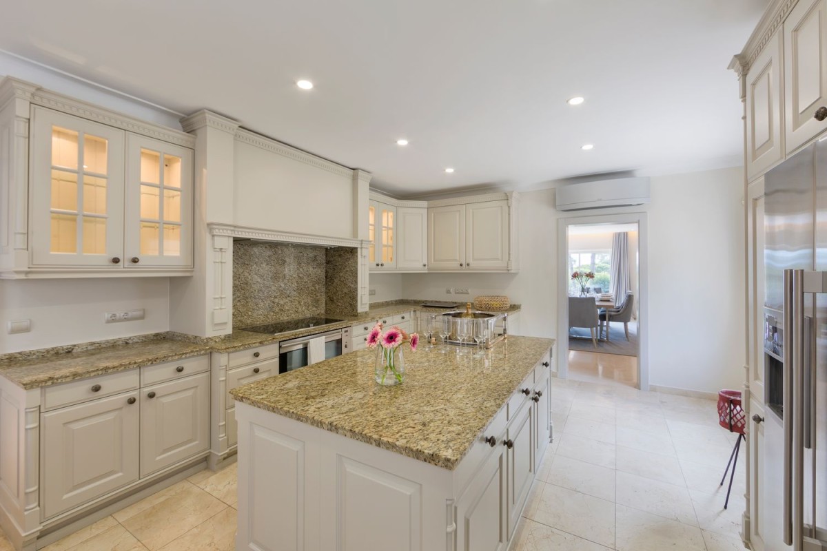 The kitchen has a large traditional kitchen