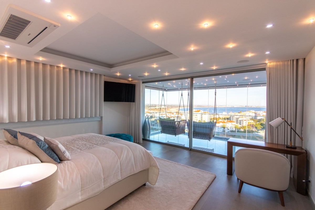 The bedrooms in the property are spacious and bright with balcony access