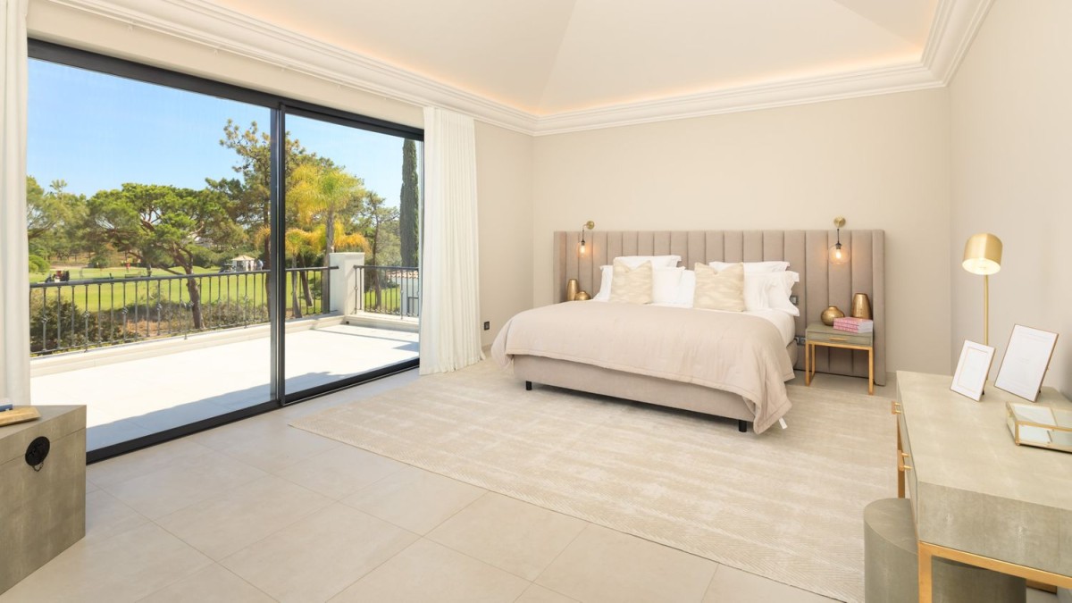 The bedrooms are spacious and bright with balcony access