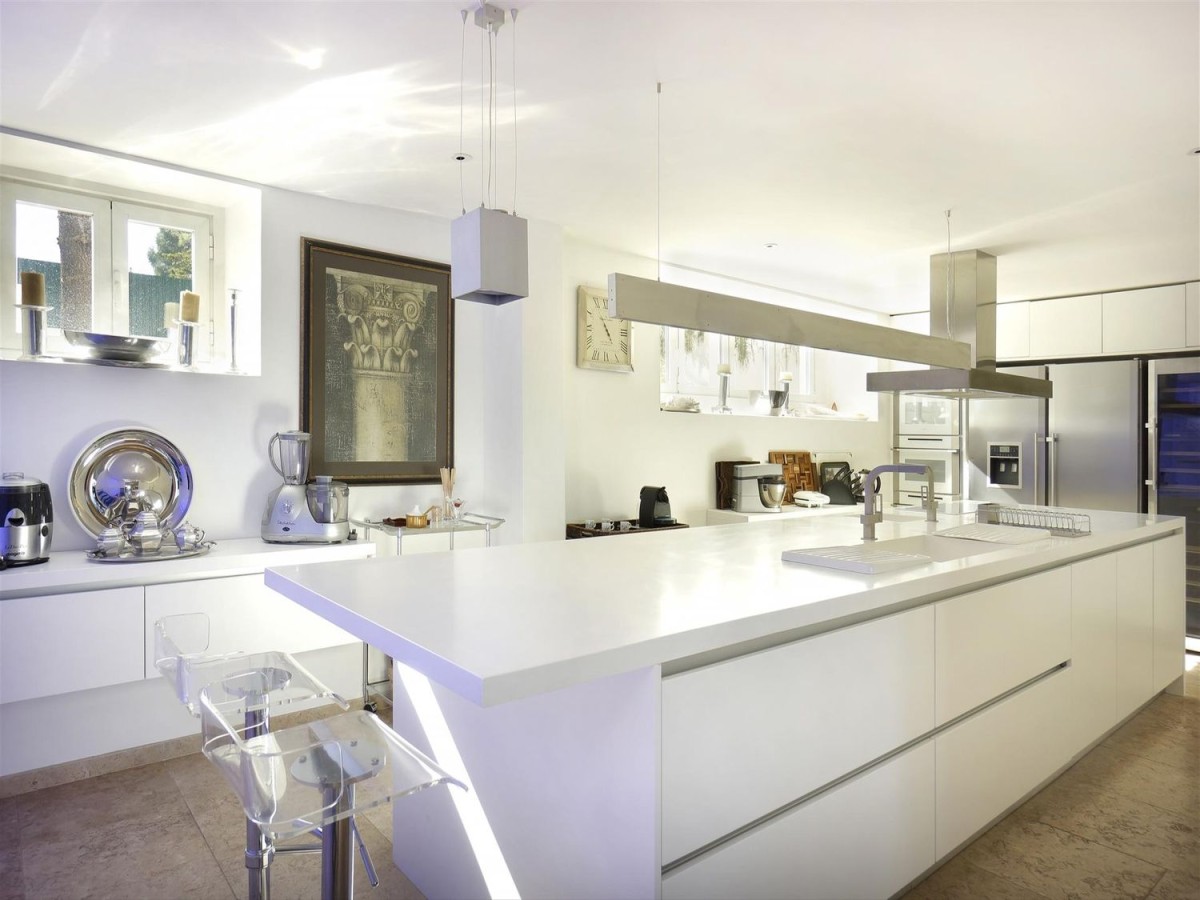 The property has a modern kitchen with island