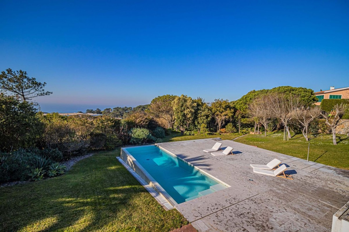 The swimming pool is spacious and has plenty of room for sunbathing