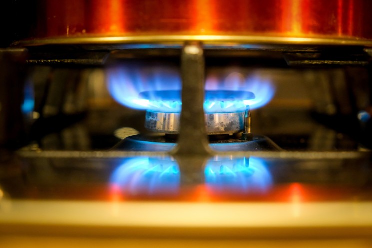 How can you save on gas in the kitchen?