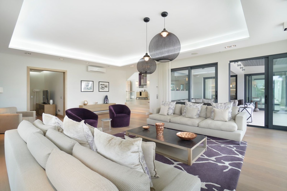 The spacious living room leads out to the terrace