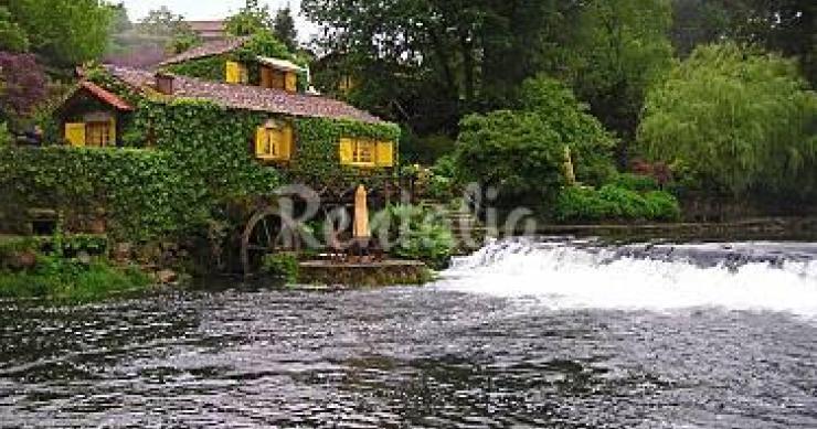 Casas de fim de semana: Um moinho encantado nas margens do Rio Coura, para gozar os verdes campos da montanha minhota