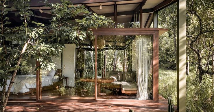 Uma casa pré-fabricada construída com papel reciclado em plena comunhão com a natureza