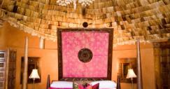 but-the-real-centerpiece-of-the-suite-is-the-bed-its-directly-under-the-banana-bark-roof-and-has