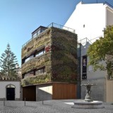 uma casa que é um jardim vertical