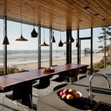 Casas de sonho: Uma mansão na praia com estrutura de aço e paredes de vidro (fotos) 